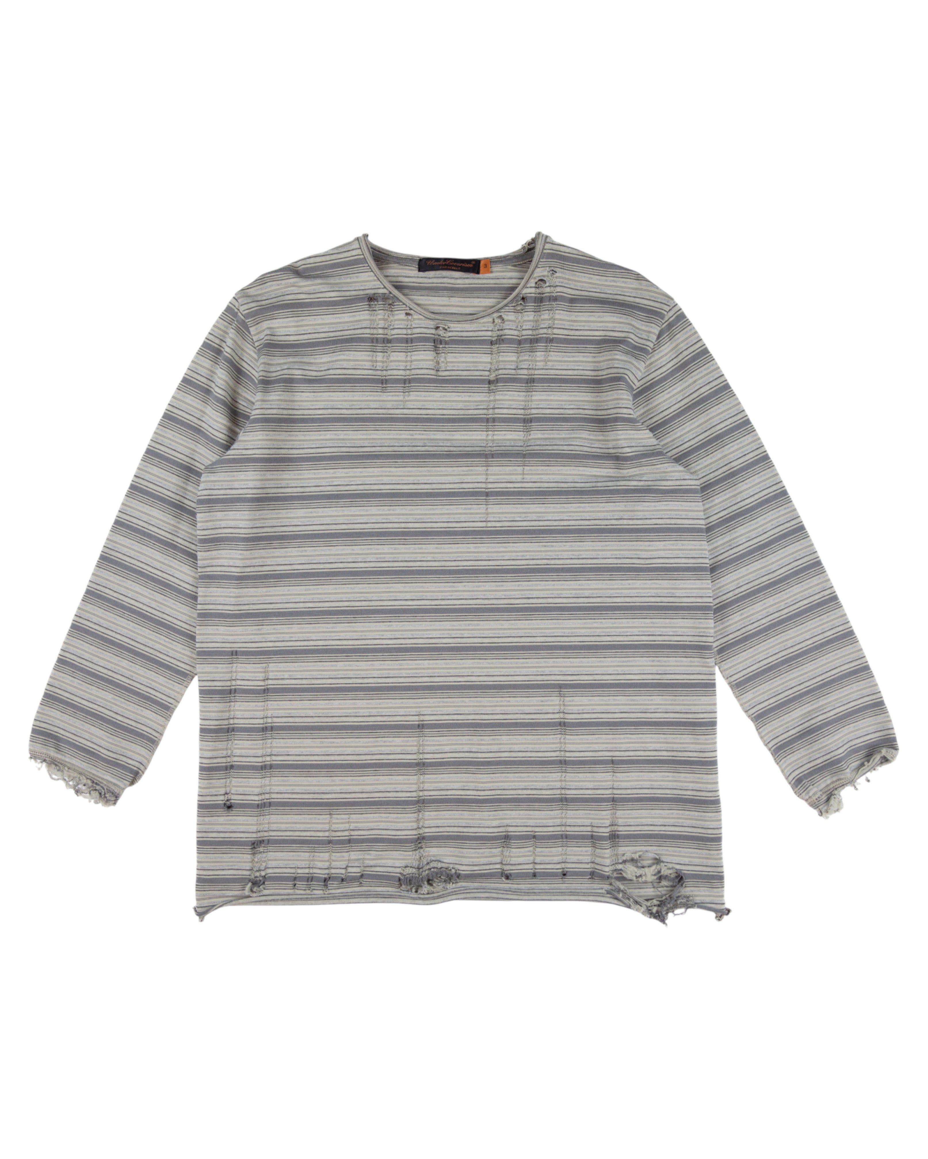 Striped long-sleeve shirt on a white background. Undercover grey/ash striped cotton long-sleeve tee / T-shirt / top; distressed and deconstructed with moth holes, laddered runs, shredded hem and raw cuffs; relaxed unisex fit; easy with denim, cargos, tailoring; style tags: punk, grunge, streetwear, avant-garde, minimal; brand context: Japanese cult label by Jun Takahashi, Tokyo artisanal design.