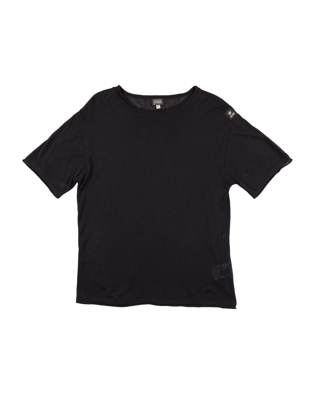 Black t-shirt on a white background. Gianfranco Ferré black short-sleeve T-shirt; crafted from soft cotton with a subtle shoulder logo patch and relaxed fit; features clean lines and Italian minimalist tailoring; understated design reflecting Ferré’s refined architectural approach to fashion and timeless sophistication.
