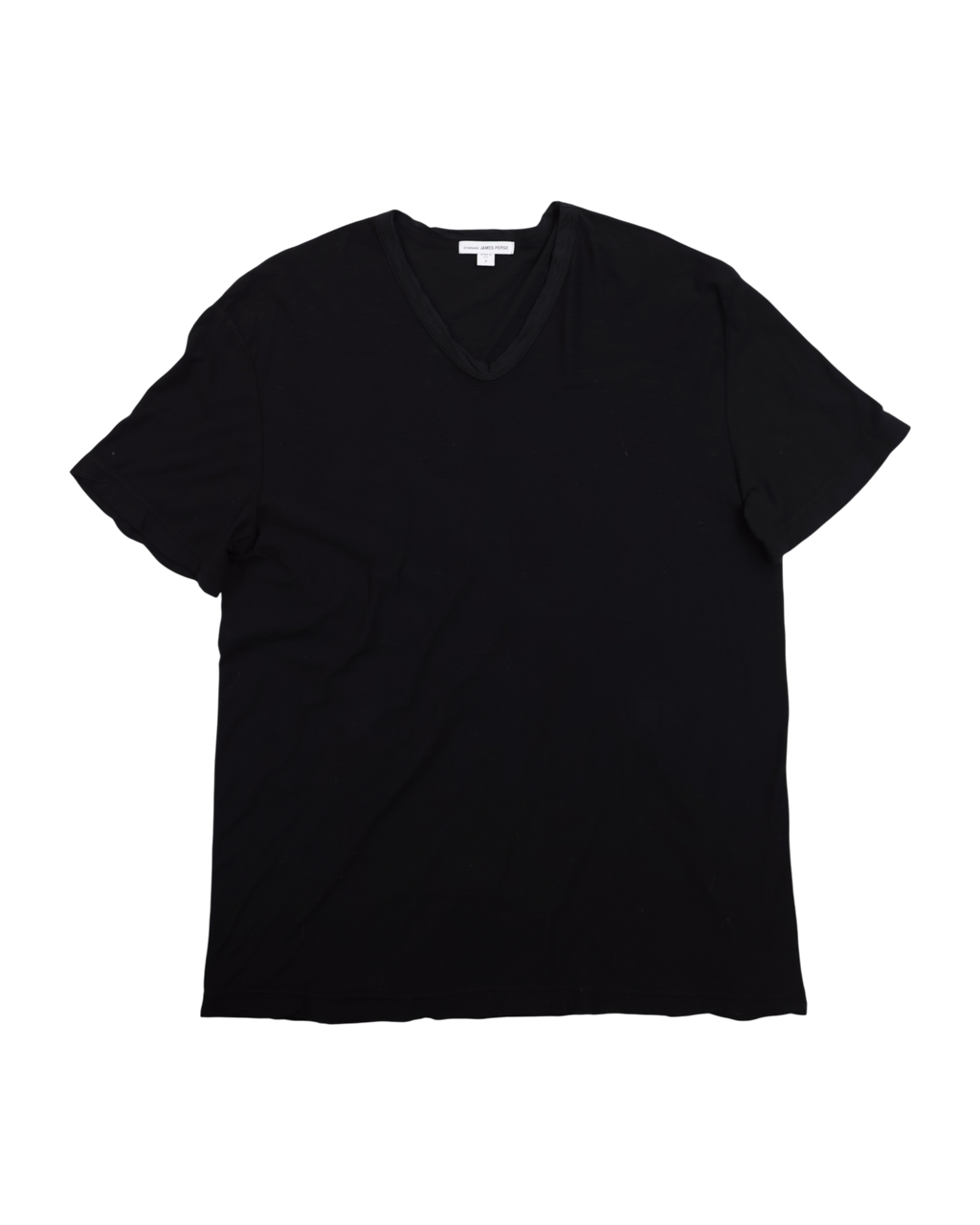 Black t-shirt on a white background. James Perse deep black V-neck short-sleeve T-shirt; soft premium cotton jersey with minimalist neckline and relaxed drape; lightweight breathable texture emphasizing understated California luxury; versatile wardrobe essential blending casual comfort and timeless refinement with signature laid-back elegance.