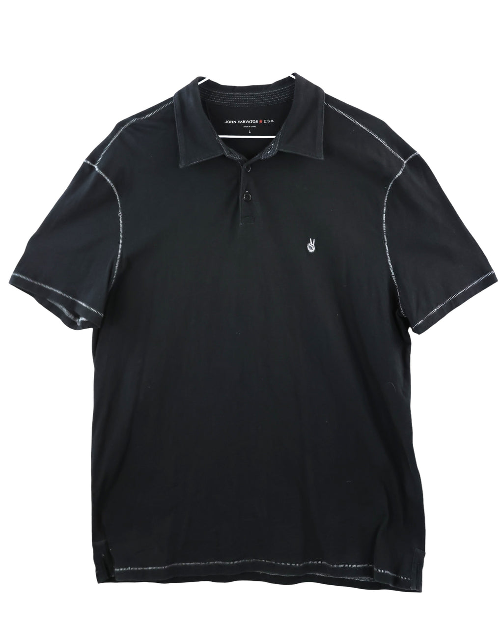 Black polo shirt with white accents on a white background. John Varvatos black/dark charcoal cotton-jersey polo shirt; contrast topstitching, soft washed hand, 2-button placket, classic knit collar; chest peace-hand embroidery; regular–slim fit, unisex; easy with jeans, chinos, under leather; style tags: rock, minimal, Americana, smart casual; American luxury label from NYC.