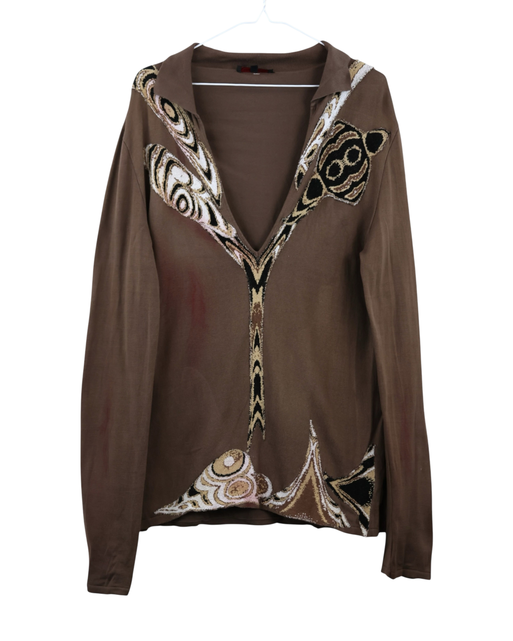 Brown cardigan with decorative patterns on a white background. Roberto Cavalli chocolate/cappuccino brown jersey long-sleeve top/blouse; deep V-neck with open collar; ornate baroque/psychedelic metallic embroidery and beadwork at neckline and hem; lightweight stretch knit; easy drape, unisex styling; works with denim, tailoring, evening looks; glam, Y2K, boho-lux; Italian luxury house with artisanal detailing; rare vintage piece.