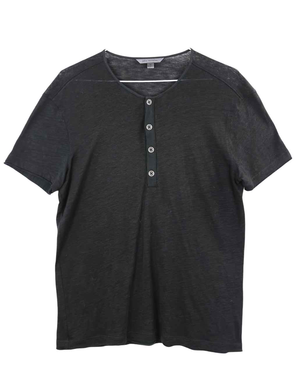 Black short-sleeve henley shirt on a white background. John Varvatos washed black Henley T-shirt; slub cotton jersey with 4-button placket, raw-edge neckline, short sleeves, slim-relaxed fit. John Varvatos Henley tee in washed black. Crafted from soft slub cotton with a four-button placket and subtle raw edges for that signature JV rock vibe. Perfect solo or layered under leather.