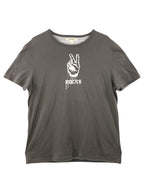 Gray t-shirt with a white graphic design on a white background. John Varvatos charcoal grey graphic T-shirt featuring a white distressed peace-hand “Rocks” print; soft washed cotton jersey with crewneck and short sleeves; relaxed vintage fit blending rebellious rock attitude and refined American luxury craftsmanship; effortlessly casual and collectible second-hand staple.