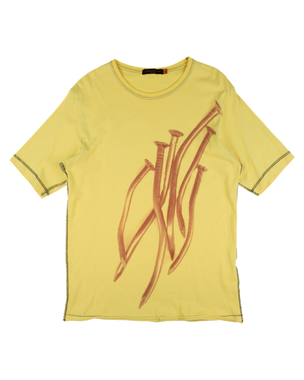 Yellow t-shirt with a red logo on a white background. Undercover yellow/lemon cotton jersey short-sleeve tee/T-shirt; oversized rust-red “nails” graphic print at front, contrast exposed seams, straight hem with small side vents; relaxed unisex fit; great with denim, cargos, streetwear layers; style tags: punk, grunge, graphic, avant-garde; brand context: Japanese cult label by Jun Takahashi, artisanal design.