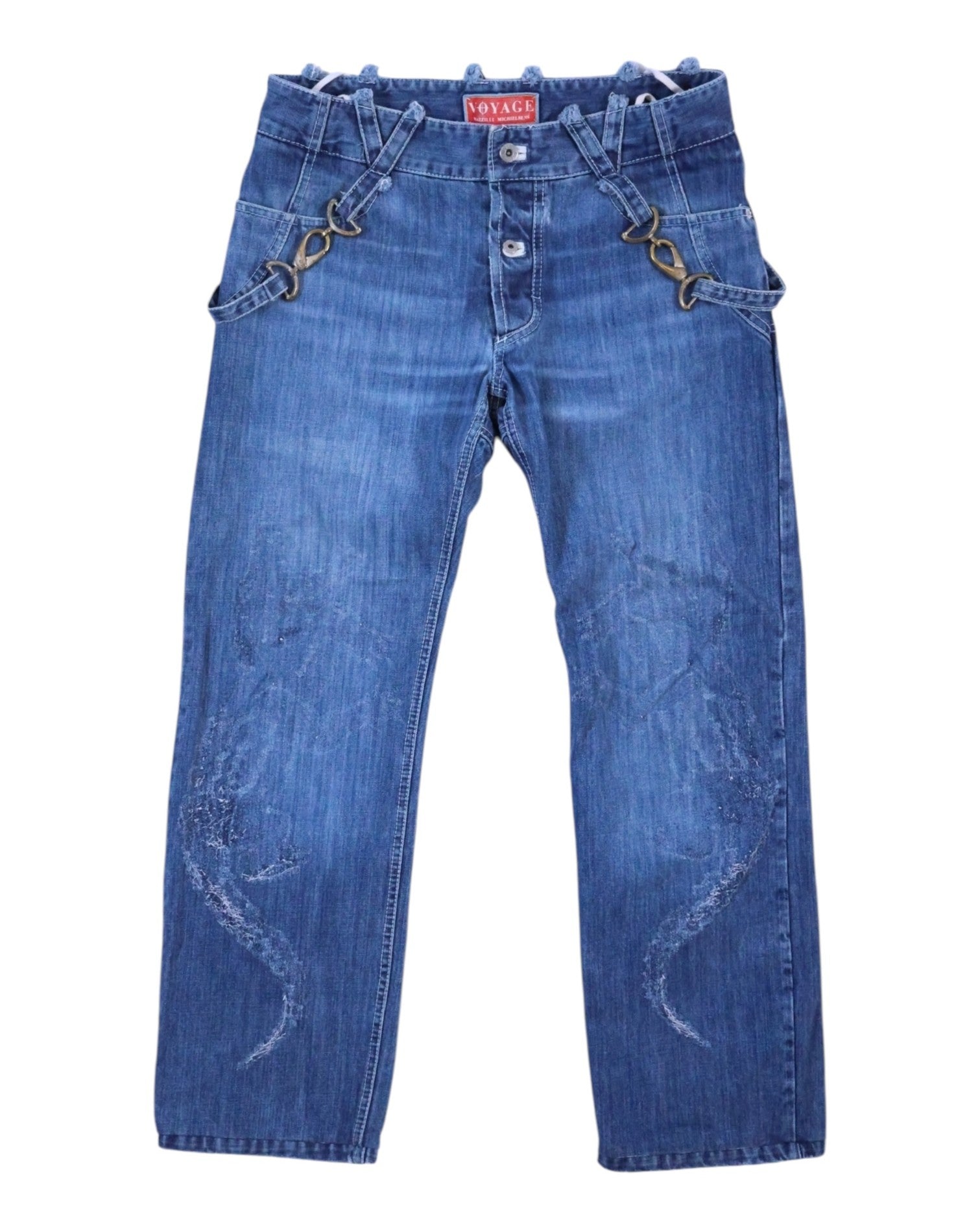 A pair of blue denim jeans with a subtle scratch design, displayed against a white background. Medium blue denim jeans with straight legs and subtle scratch-like designs on both legs, finished with multiple belt straps and metal D-rings plus a button fly; vintage designer, rare.