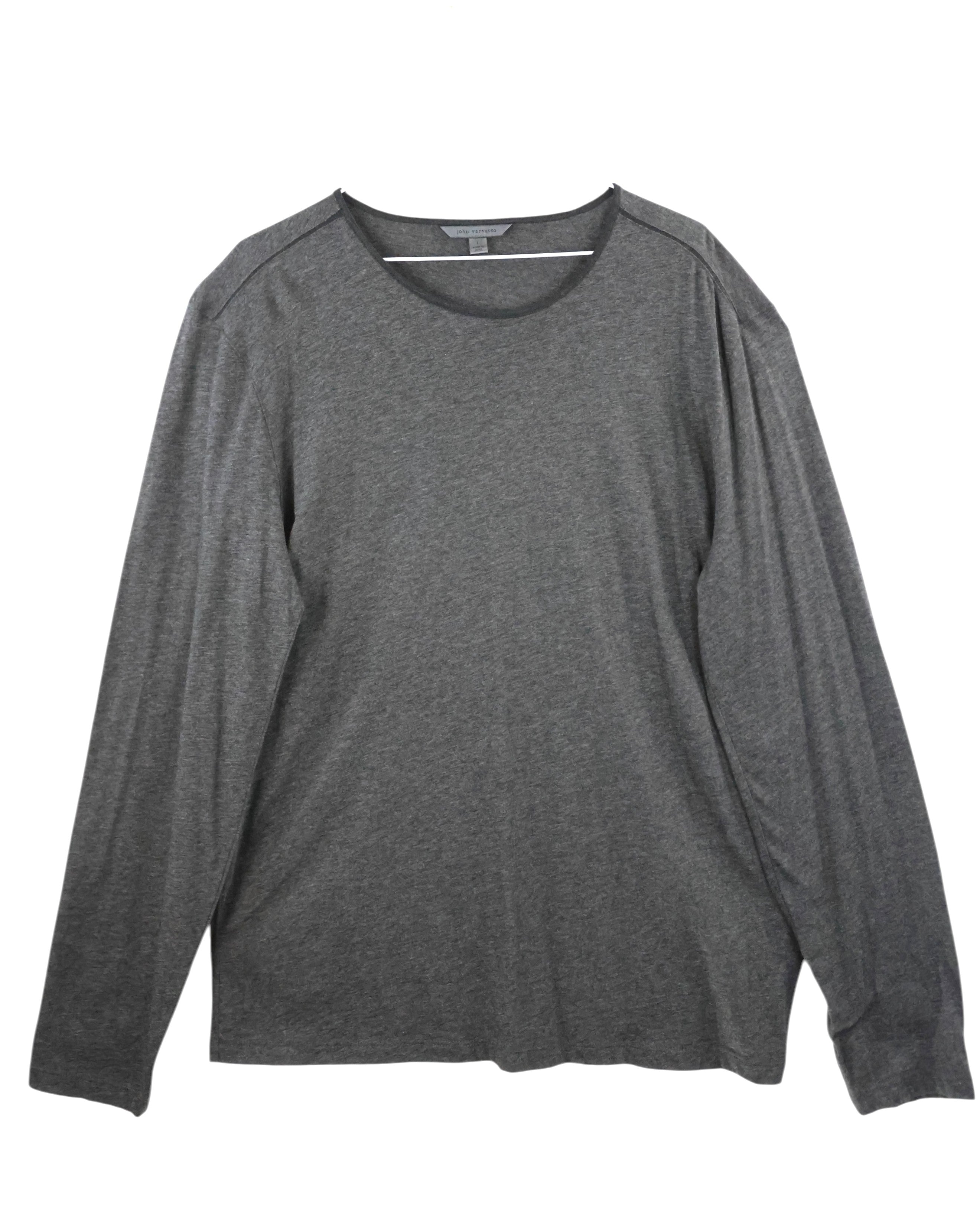 Gray long-sleeve shirt on a white background. John Varvatos dark grey/charcoal long-sleeve T-shirt; ultra-soft jersey, crew neck, clean hems; lightweight drape, comfortable stretch; relaxed modern fit, unisex; easy layering with denim, leather jackets, tailoring; style tags: rock, minimalist, casual luxe; brand context: American designer label with rock-inspired heritage craftsmanship; versatile wardrobe staple.