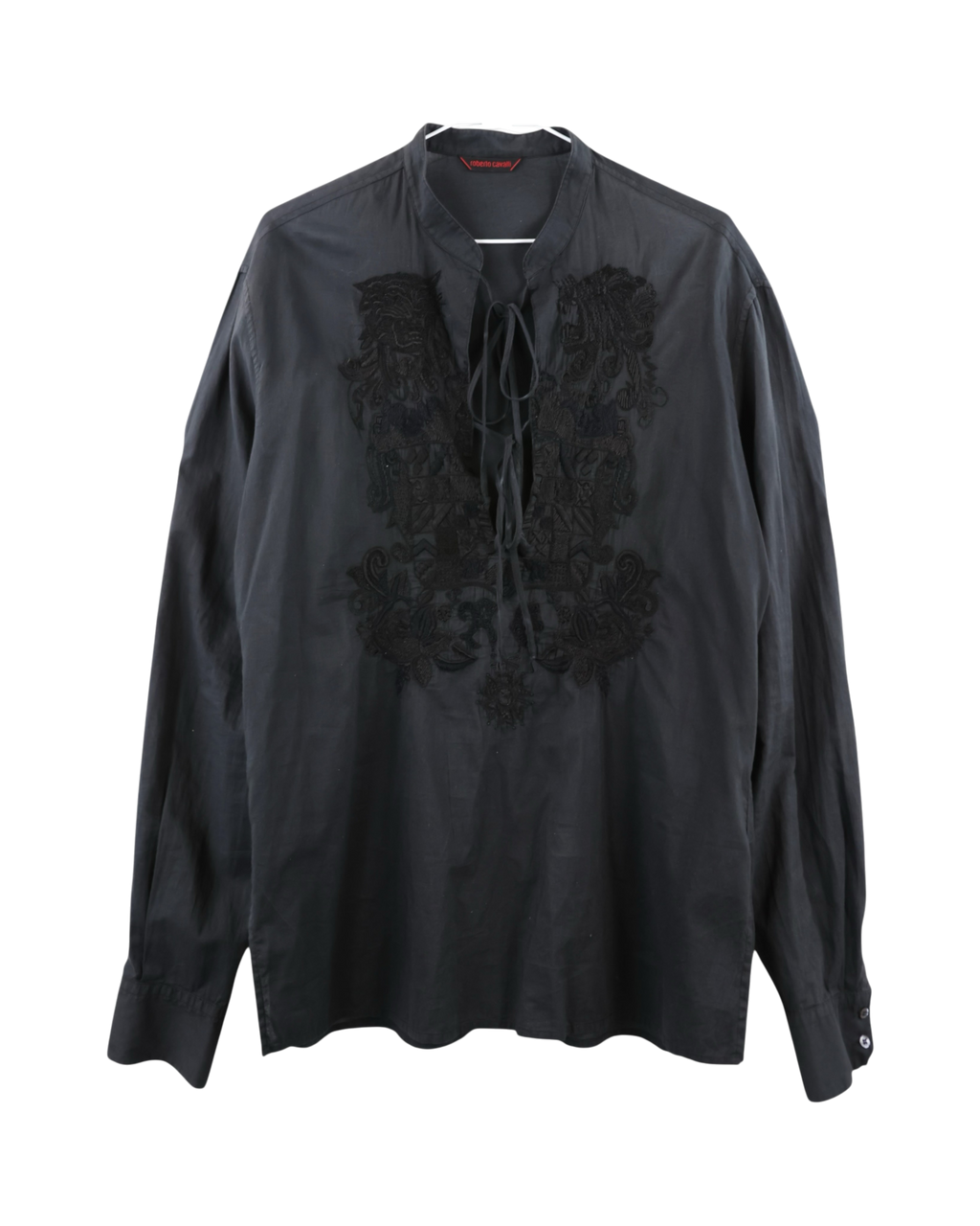 Roberto Cavalli black blouse / poet shirt / tunic top in cotton poplin; deep V lace-up neckline, ornate tonal Baroque embroidery, band collar, button cuffs, fluid relaxed drape; pairs with jeans or tailoring; rock, bohemian, romantic; Italian luxury house heritage, crafted in Europe; rare runway-style piece.