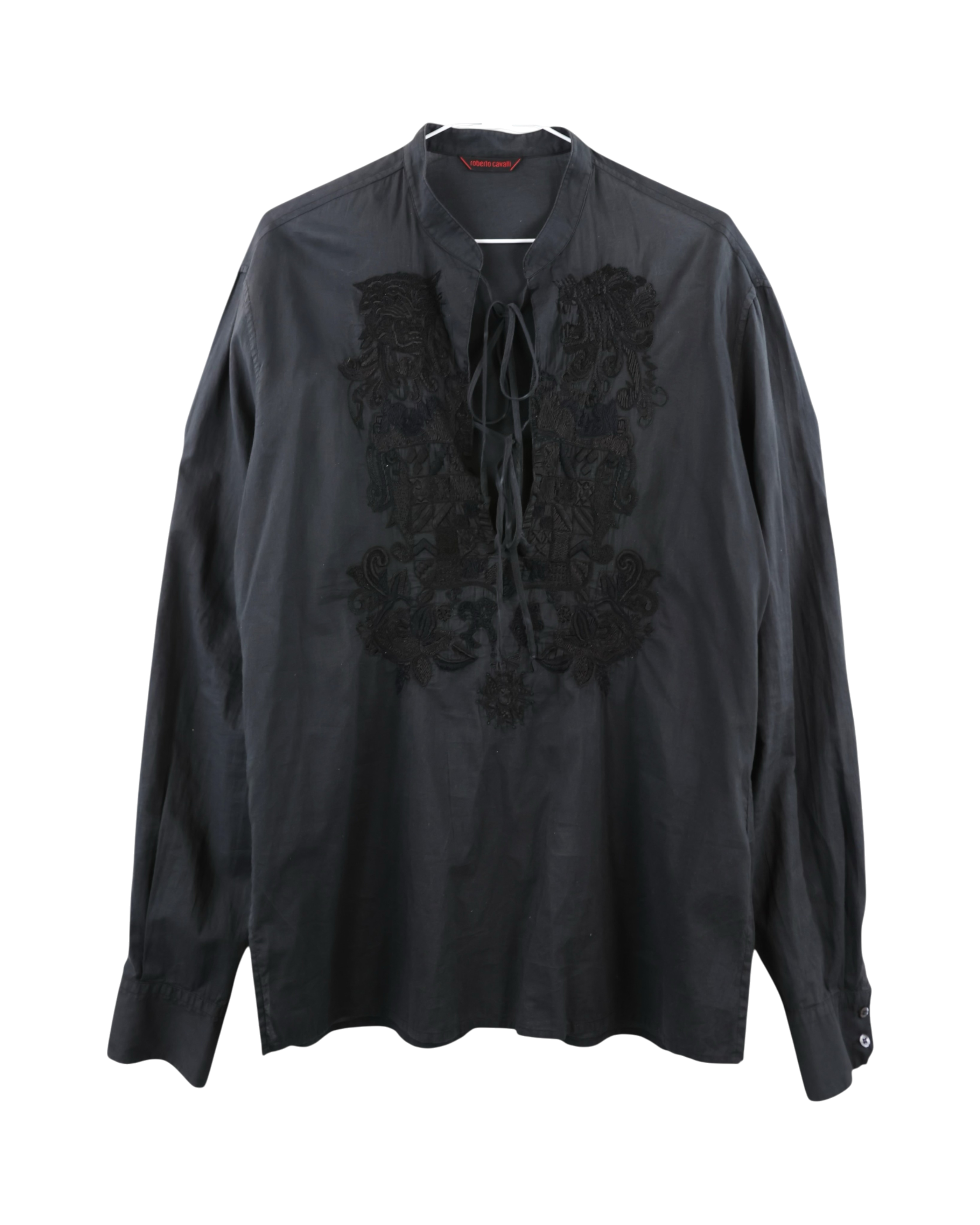 Roberto Cavalli black blouse / poet shirt / tunic top in cotton poplin; deep V lace-up neckline, ornate tonal Baroque embroidery, band collar, button cuffs, fluid relaxed drape; pairs with jeans or tailoring; rock, bohemian, romantic; Italian luxury house heritage, crafted in Europe; rare runway-style piece.